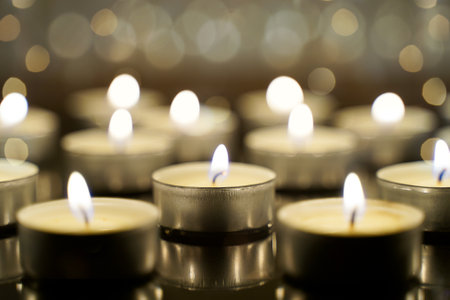 Burning candles in the night. Festive Christmas backgroundの写真素材