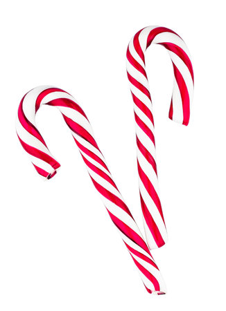 Two candies canes striped in Christmas colours. isolatedの写真素材