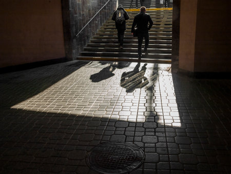 People walk in an underground passage