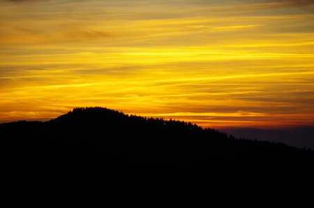 Yellow Sunset on a cold evening in the Black Forest.の写真素材
