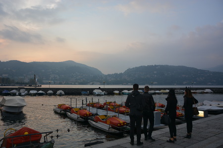 Sunset, friends on the shore of Lake Comoのeditorial素材