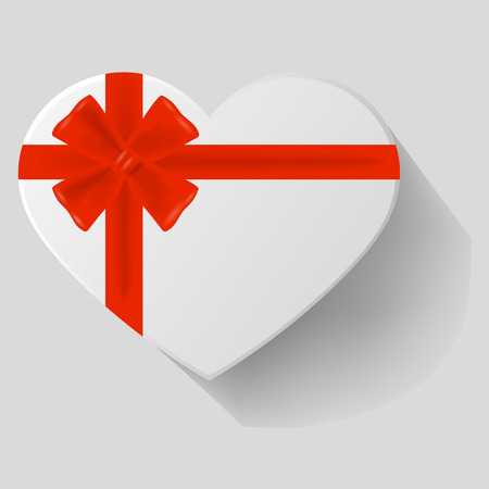 Heart-shaped gift with red bowのイラスト素材