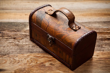 Old chest on wooden tableの写真素材