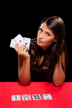 young woman playing in the gambling in casinoの写真素材