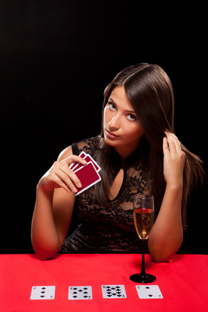 young woman playing in the gambling in casinoの写真素材