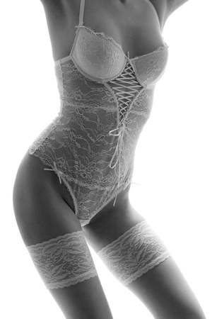 Young and sexy woman in white lingerieの写真素材
