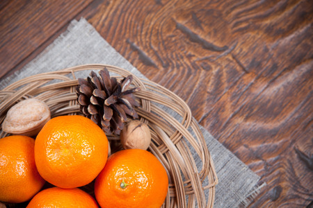 Tangerines on old wooden tableの写真素材
