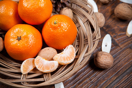 Tangerines on old wooden tableの写真素材