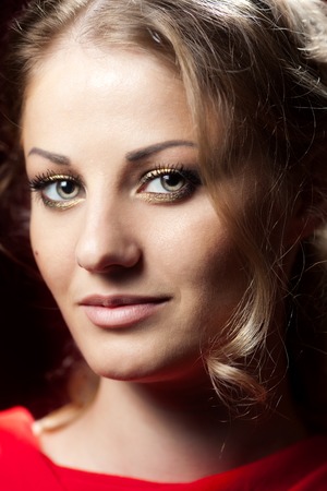 Close-up portrait of young blonde womanの写真素材