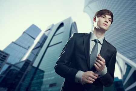 Portrait of serious young businessman in an urban settingの写真素材