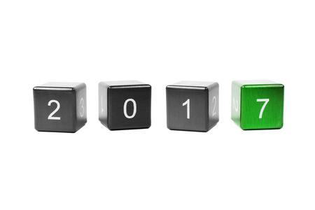 Wooden cubes with numbers isolated on white background. Concept new year 2017.の写真素材