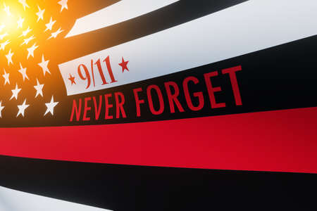 Thin red line firefighter flag with light spot. USA flag. Remembering, memories on fallen firefighters officers on September 11, 2001. Patriot day. Firefighter members honor.の写真素材