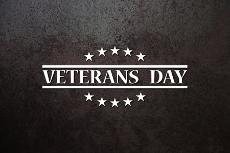 Veterans Day inscription on rusty iron background. American holiday poster. Banner, flyer, sticker, greeting card, postcard.の写真素材