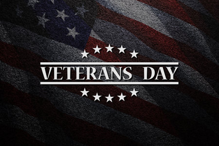 Veterans Day inscription on black textured background with USA flag. American holiday poster. Banner, flyer, sticker, greeting card, postcard.の写真素材