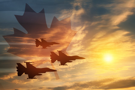 Air Force Day. Aircraft silhouettes on background of sunset with a transparent Canadian flag. Since 2006, the Royal Canadian Air Force has celebrated Air Force Day on 4 June.の写真素材