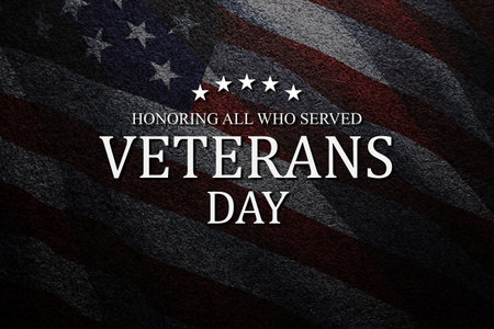 Veterans Day Honoring All Who Served inscription on black textured background with USA flag. American holiday poster. Banner, flyer, sticker, greeting card, postcard.の写真素材