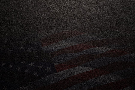 Black textured background with image USA flag. American holiday poster. Banner, flyer, sticker, greeting card, postcard.の写真素材