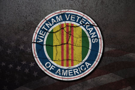 Symbol of the Vietnam Veterans of America on rusty iron background. Vietnam Veterans Day. General commemoration in the Armed Forces. Grunge style.の写真素材