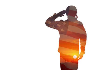 Silhouette of soldier with print of sunset and USA flag saluting isolated on white background. Greeting card for Veterans Day, Memorial Day, Independence Day. America celebration.の写真素材