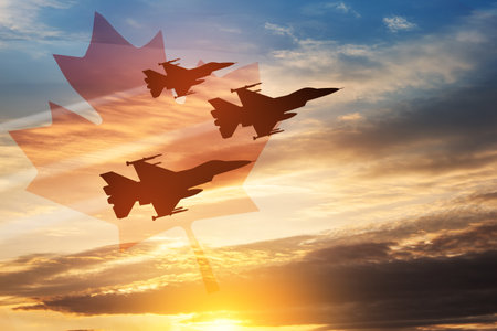 Air Force Day. Aircraft silhouettes on background of sunset with a transparent Canadian flag. Since 2006, the Royal Canadian Air Force has celebrated Air Force Day on June 4.の写真素材