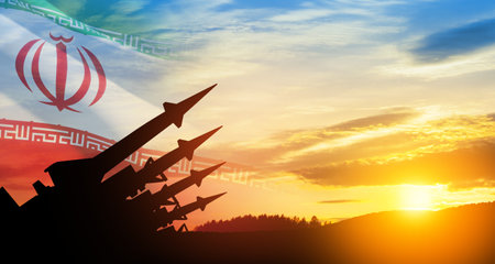 The missiles are aimed at the sky at sunset with Iran flag. Bomb, chemical weapons, missile defense, a system of salvo fire.の写真素材
