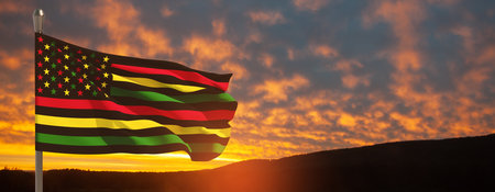 Alternative Juneteenth Flag on flagpole with sunrise or sunset. Since 1865. Banner with place for text.の写真素材