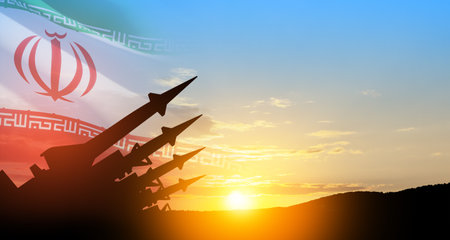 The missiles are aimed at the sky at sunset with Iran flag. Bomb, chemical weapons, missile defense, a system of salvo fire.の写真素材