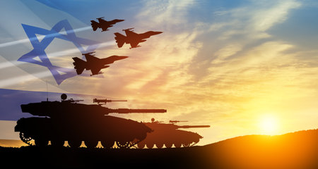 Silhouettes of army tanks and fight planes on background of sunset with a transparent waving Israel flag. Military machinery. Independence day.の写真素材