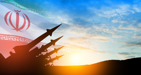 The missiles are aimed at the sky at sunset with Iran flag. Bomb, chemical weapons, missile defense, a system of salvo fire.の写真素材