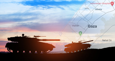Silhouettes of army tanks at sunset sky background with map of Gaza. Israeli ground operation in Gaza.の写真素材
