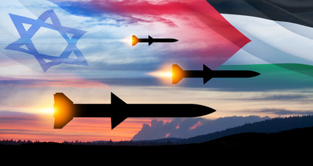 Confrontation between Palestine and Israel. Fired missiles fly to the target. Missiles at the sky at sunset with Palestine flag and Israel flag. Missile defense, a system of salvo fire.の写真素材