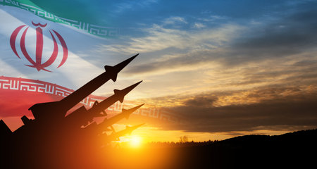 The missiles are aimed at the sky at sunset with Iran flag. Bomb, chemical weapons, missile defense, a system of salvo fire.の写真素材