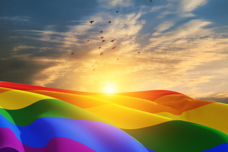 Waving LGBT pride flag on sunset sky with flying birds, rainbow flag background. Multicolored peace flag movement. Original colors symbol.の写真素材