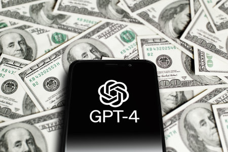 GPT-4 logo on screen smartphone on background of dollars. GPT-4 is a chatbot by OpenAI. Moscow, Russia - March 22, 2023.のeditorial素材
