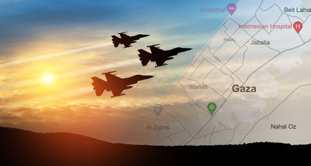 Silhouettes of fight planes on background of sunset with map of Gaza. Israeli ground operation in Gaza.の写真素材