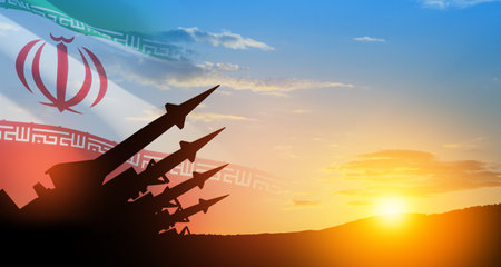 The missiles are aimed at the sky at sunset with Iran flag. Bomb, chemical weapons, missile defense, a system of salvo fire.の写真素材