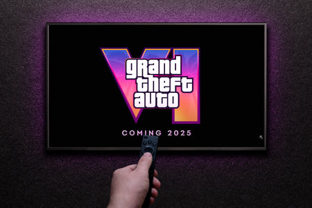 Grand Theft Auto 6 trailer game on TV screen. Man turns on TV with remote control. Astana, Kazakhstan - December 5, 2023.のeditorial素材