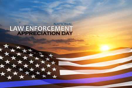 Law enforcement appreciation day is observed every year on January 9. USA flag and inscription on background of sunset sky.の写真素材