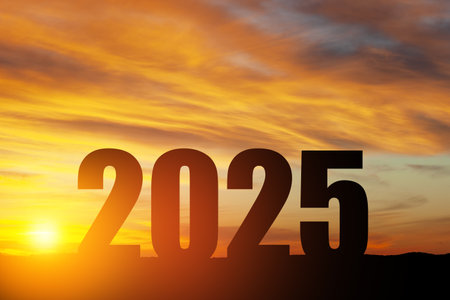 Silhouette 2025 with sunset sky at mountain and number like 2025 abstract background.の写真素材