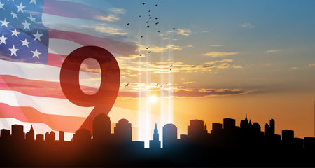 September 11 Tribute In Light Art Installation in the Lower Manhattan New York City Skyline at Sunset with USA flag and birds flying up like souls. 9.11 date concept. American Patriot Day banner.の写真素材