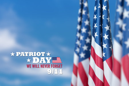 Patriot Day. USA flag on blue sky background. National Day of Remembrance for the Victims of the Terrorist Attacks.の写真素材