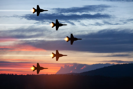 Air Force Day. Aircraft silhouettes on background of sunset.