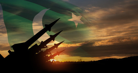 The missiles are aimed at the sky at sunset with Pakistan flag. Missile defense.の写真素材
