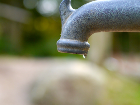 drippy tap outdoor gray vintageの写真素材