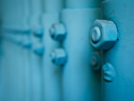 blue coated groove in a rowの写真素材