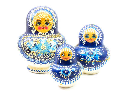 blue russian dolls isolated on white backgroundの写真素材