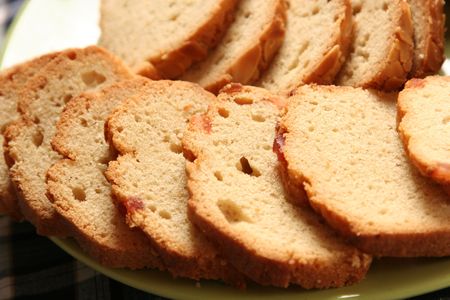 Fresh Vanilla cake with dried fruits on fabric background