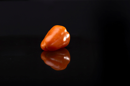 chili pepper isolated on a black backgroundの写真素材
