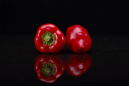 chili pepper isolated on a black backgroundの写真素材