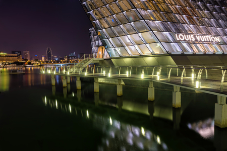 Marina Bay, Singapore - April 1 2018 - View Of Louis Vuitton During at midnightのeditorial素材